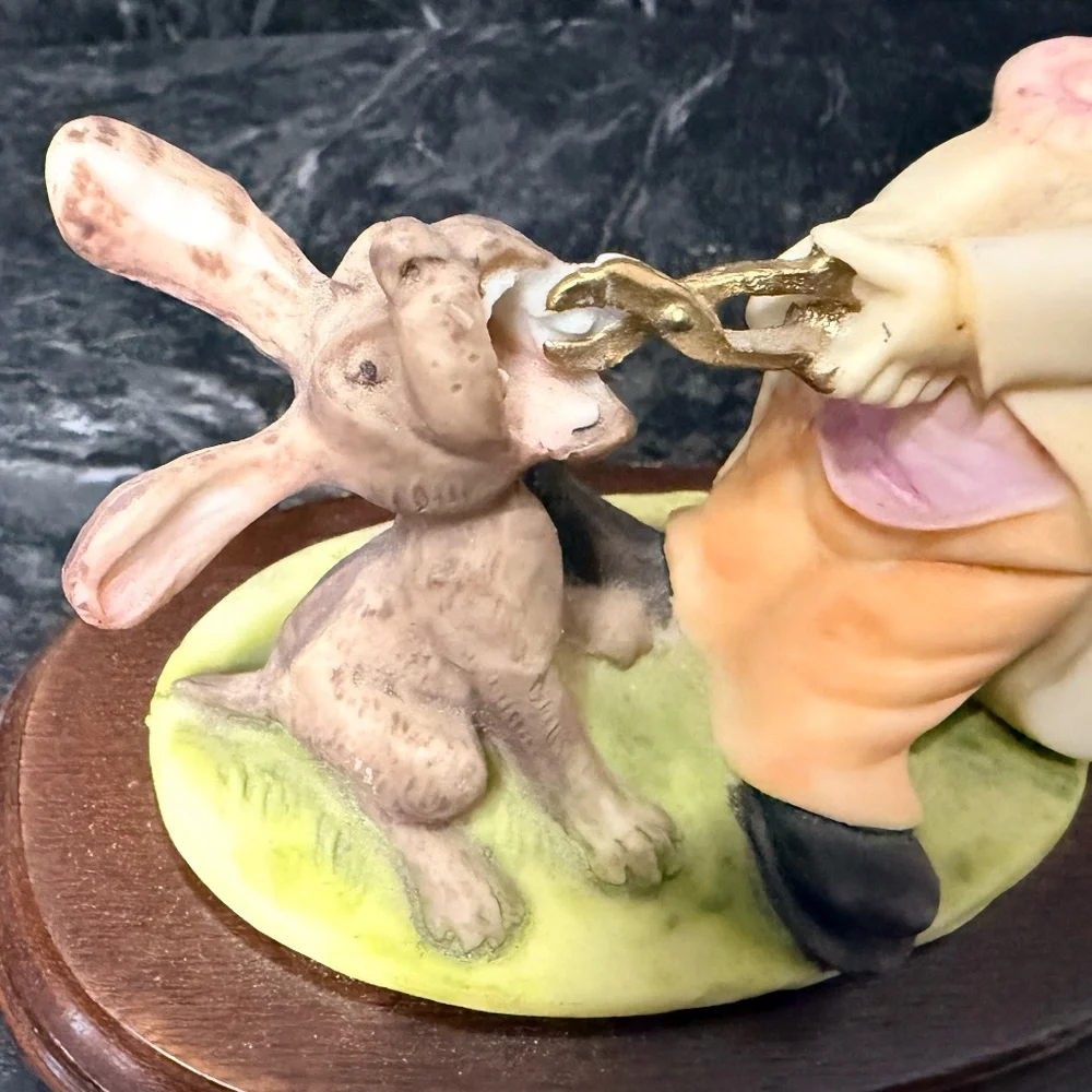 Dentist Clown Pulling Rabbits Tooth Figurine